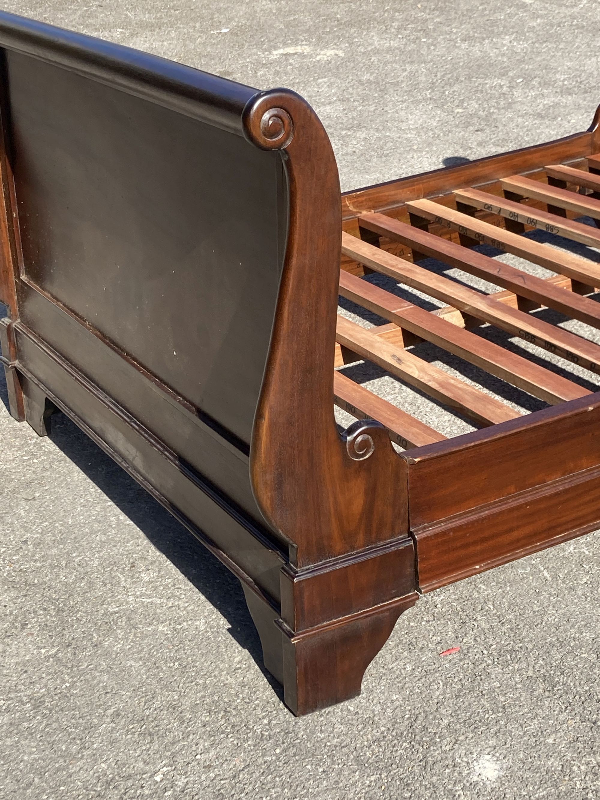 A reproduction mahogany sleigh bed, width 145cm, length 205cm